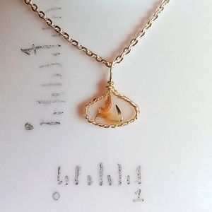 Floral necklace, amulet